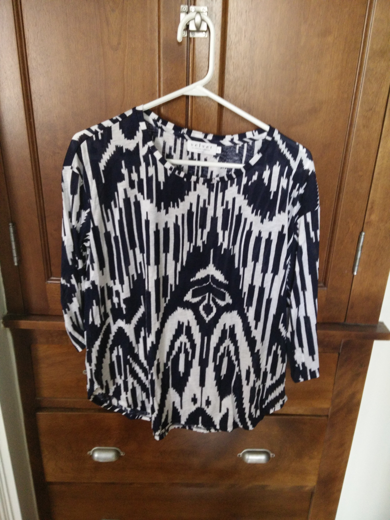 Illustration for article titled Selling a couple of nice blouses